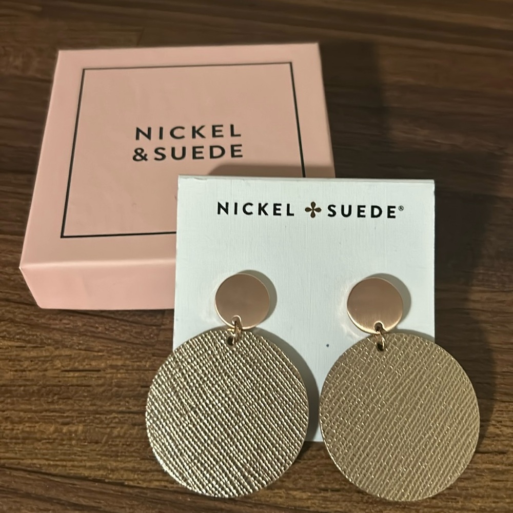 Nickel and Suede leather earrings.